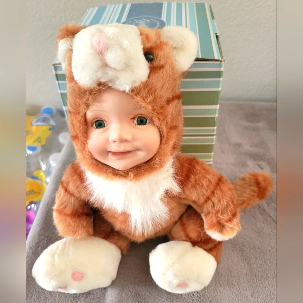 Vintage porcelain Baby Doll dressed as kitten